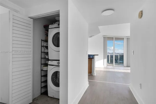 a view of a storage & utility room with washer and dryer