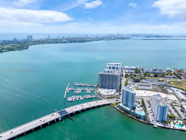 a view of a city with an ocean view