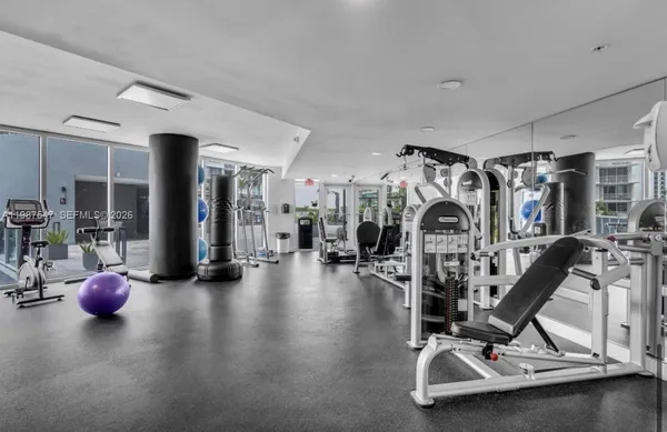 a view of a room with gym equipment
