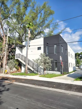 a view of a building with a street