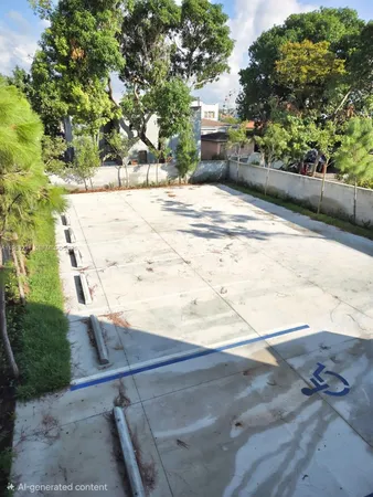 a view of parking area of a house