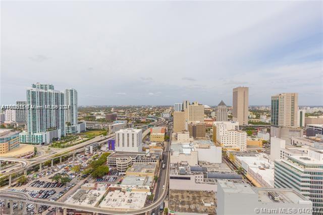 151 Southeast 1st Street, Unit 2811 Miami, FL 33131 - Photo 17 of 18 a view of a city with tall buildings