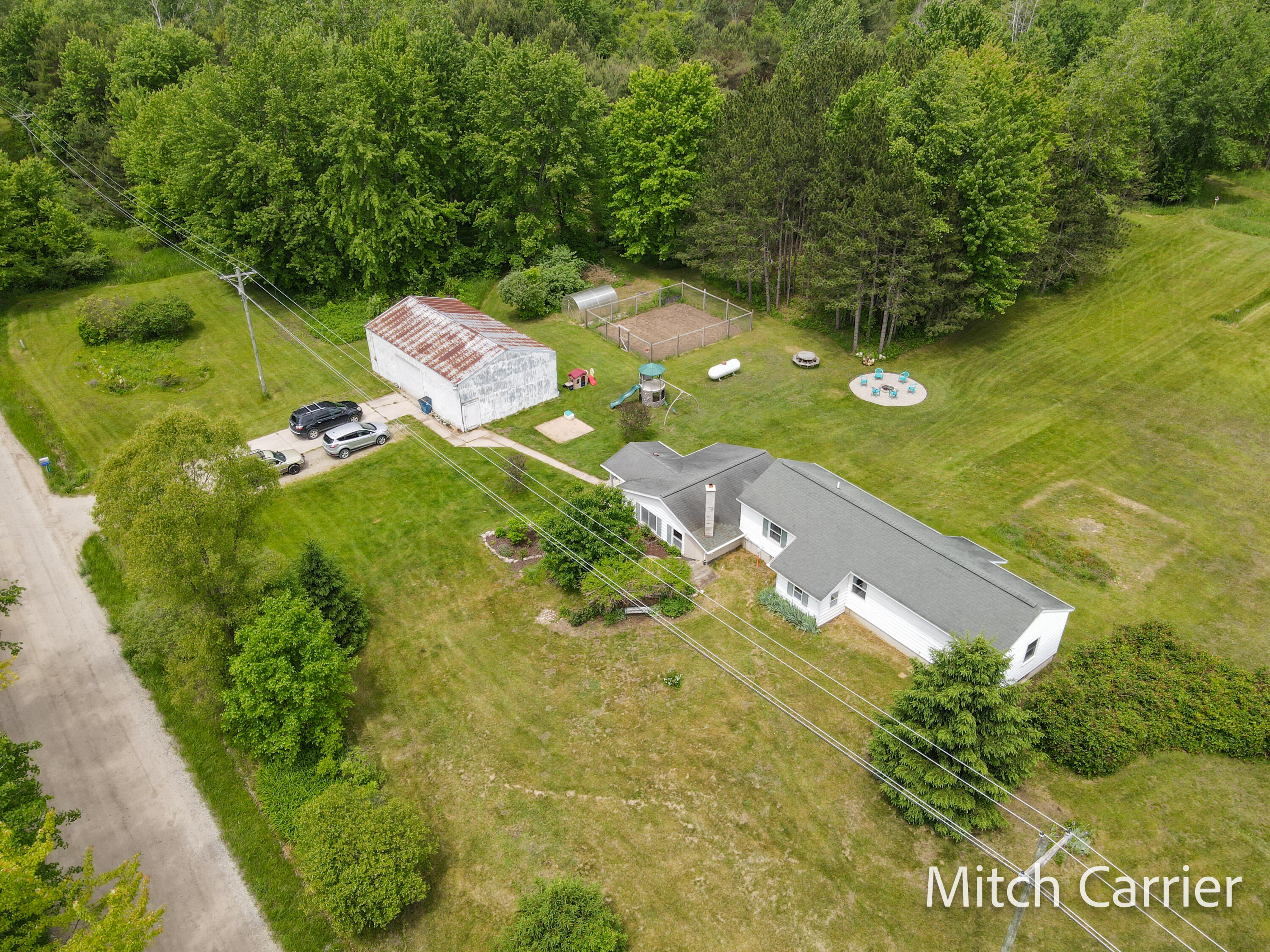 7623 20 Mile Road Northeast Sand Lake, MI 49343 - Photo 1 of 41 DJI_0188