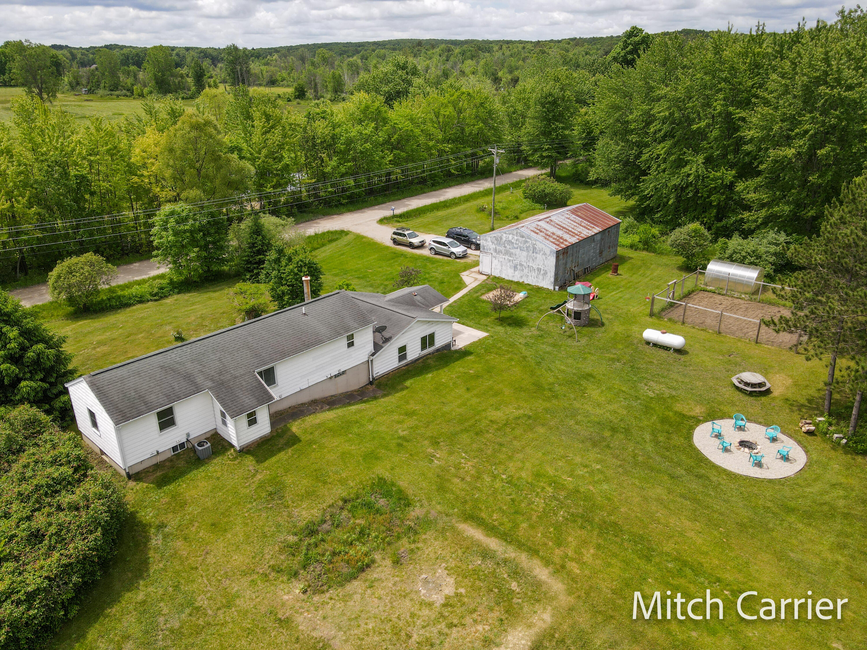 7623 20 Mile Road Northeast Sand Lake, MI 49343 - Photo 2 of 41 DJI_0191
