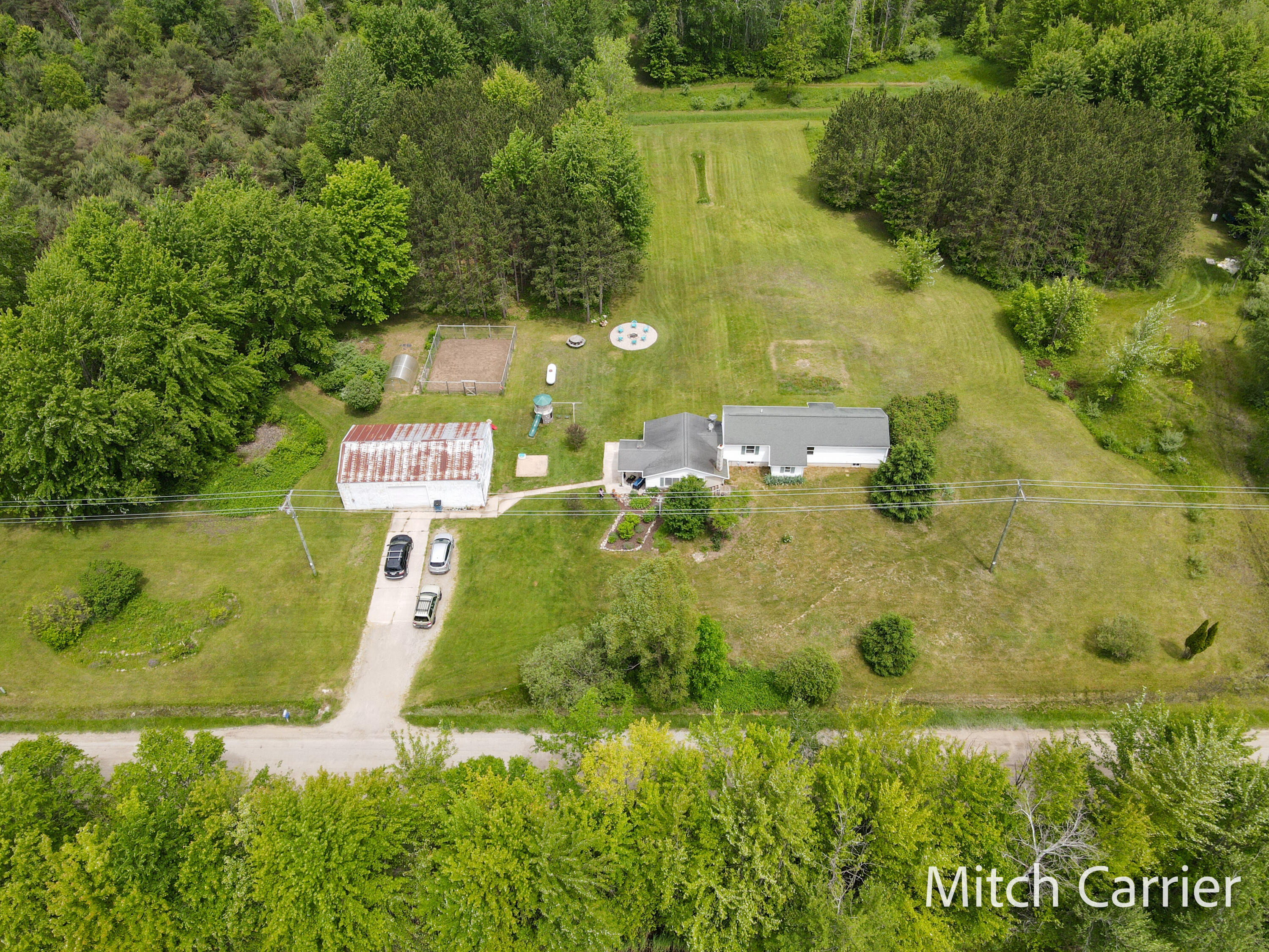 7623 20 Mile Road Northeast Sand Lake, MI 49343 - Photo 3 of 41 DJI_0186