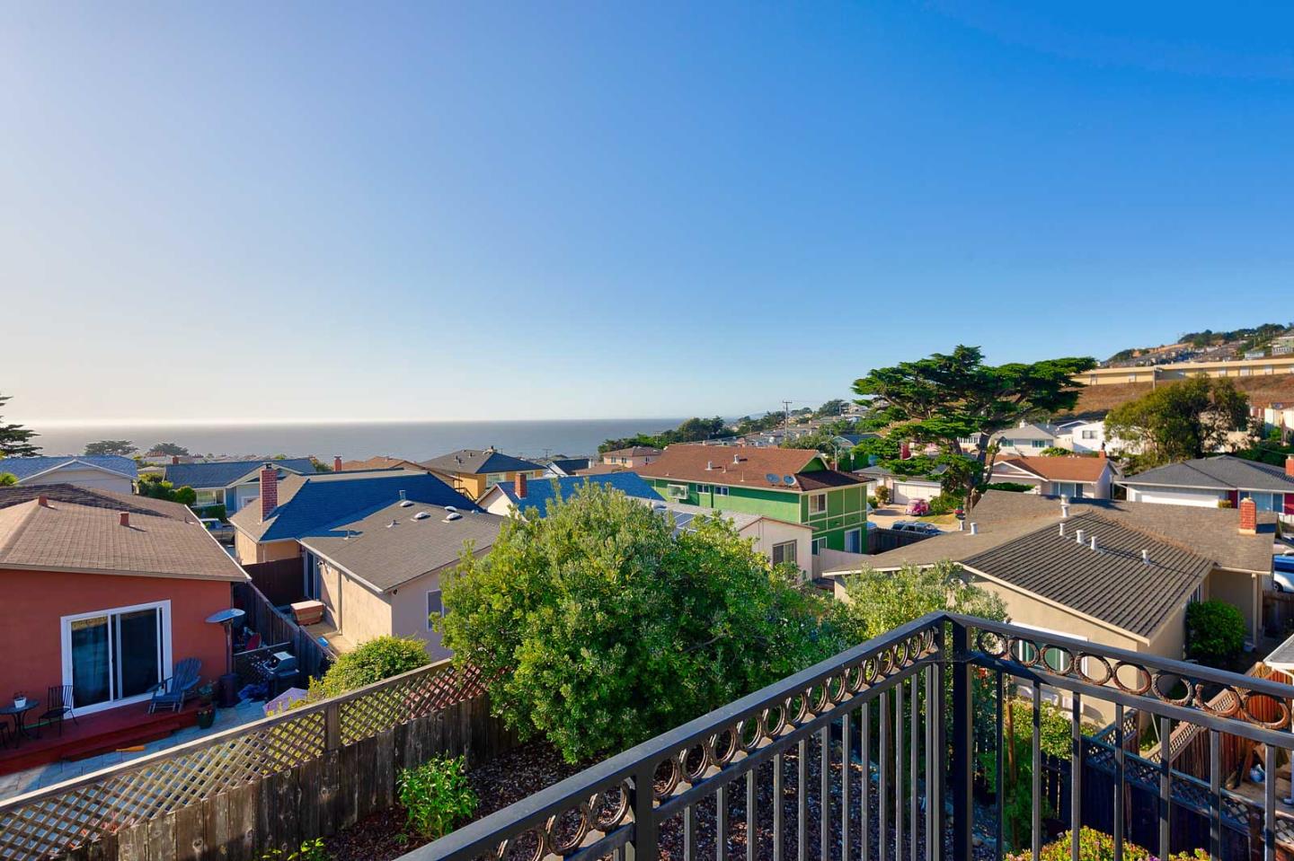 a view of a city from a balcony