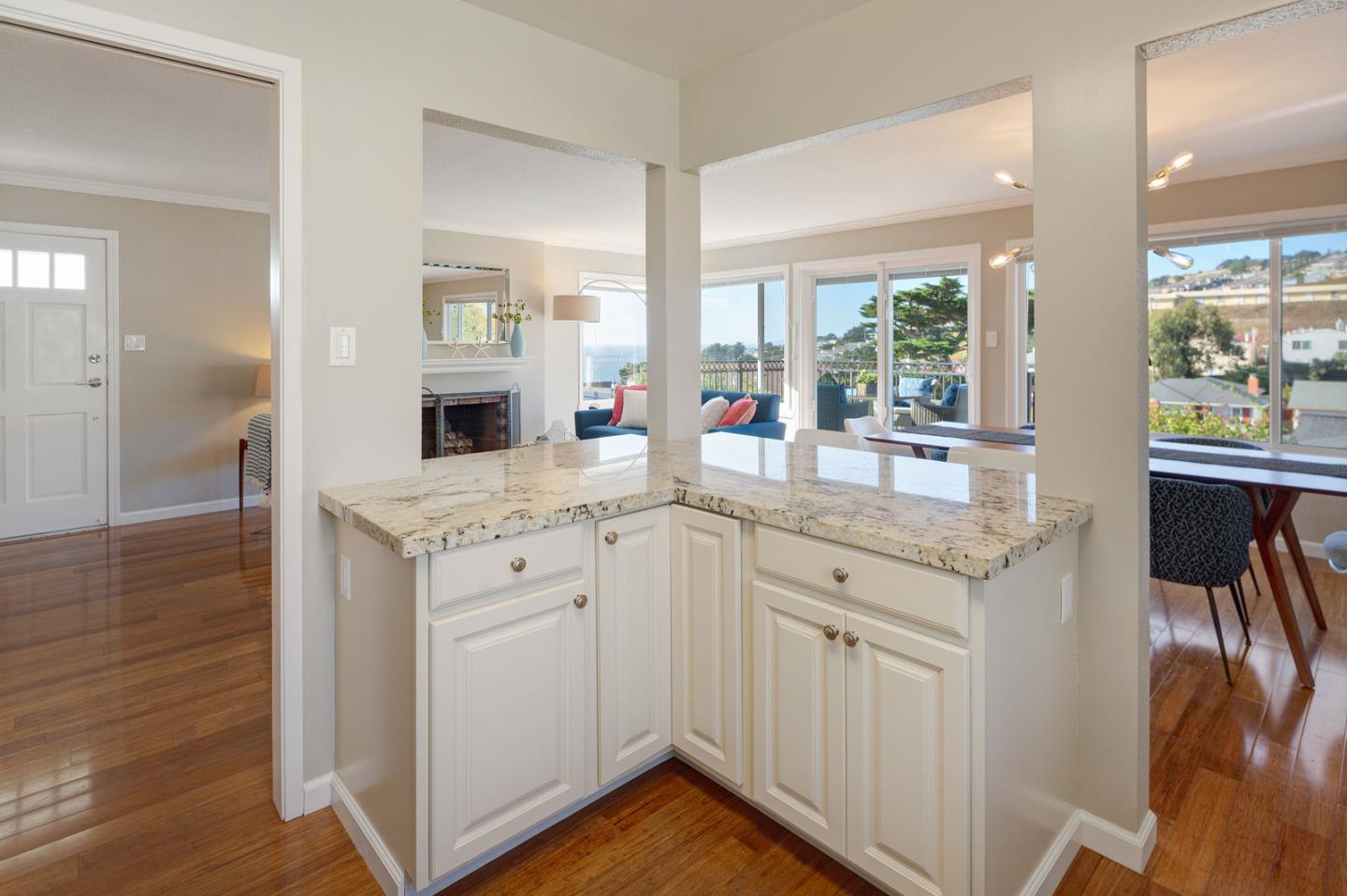 17 Moon Gate Court Pacifica, CA 94044 - Photo 15 of 36 a spacious bathroom with double vanity and a mirror