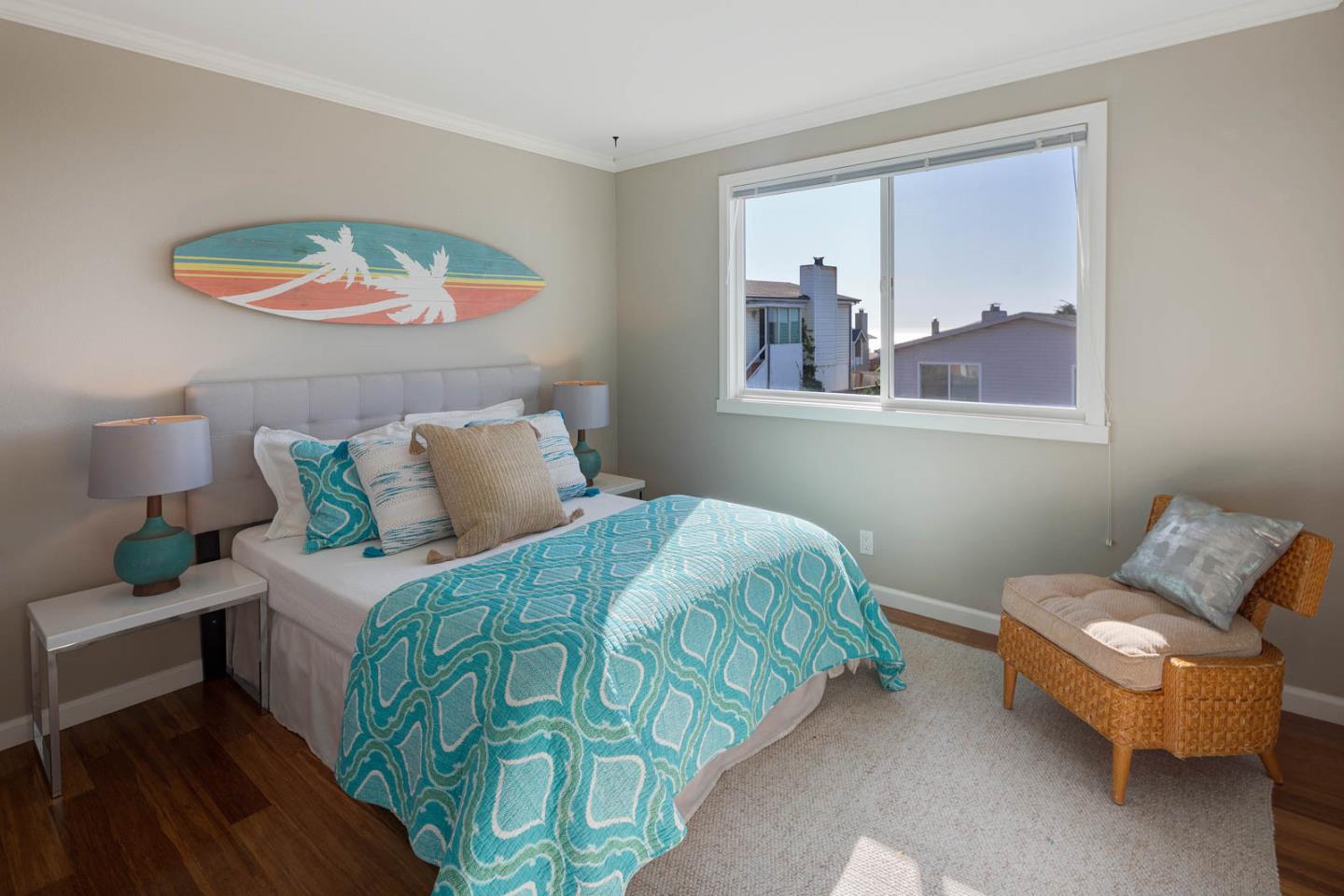 17 Moon Gate Court Pacifica, CA 94044 - Photo 18 of 36 a bedroom with a bed and a painting on the wall