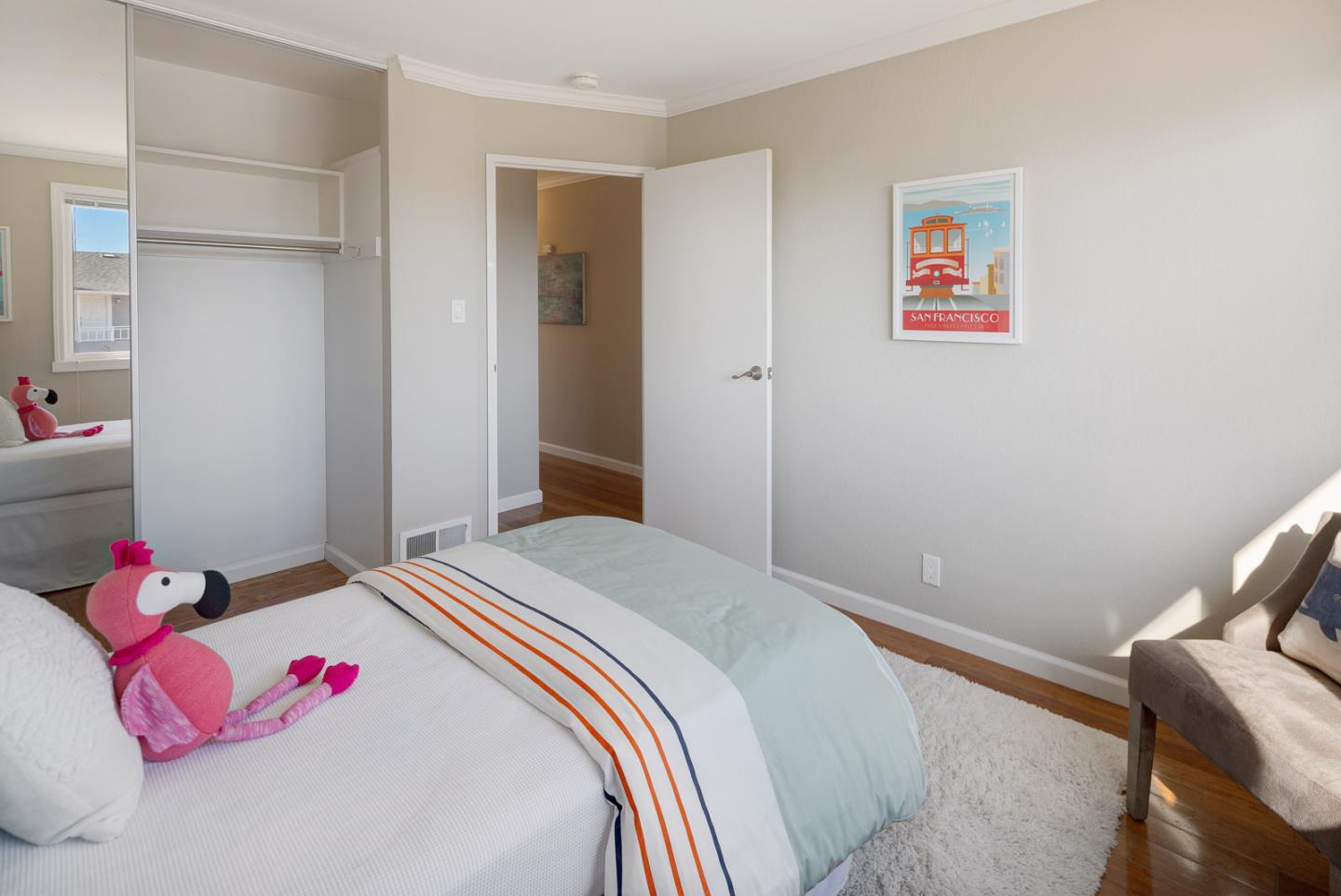 17 Moon Gate Court Pacifica, CA 94044 - Photo 21 of 36 a bedroom with a bed and a couch