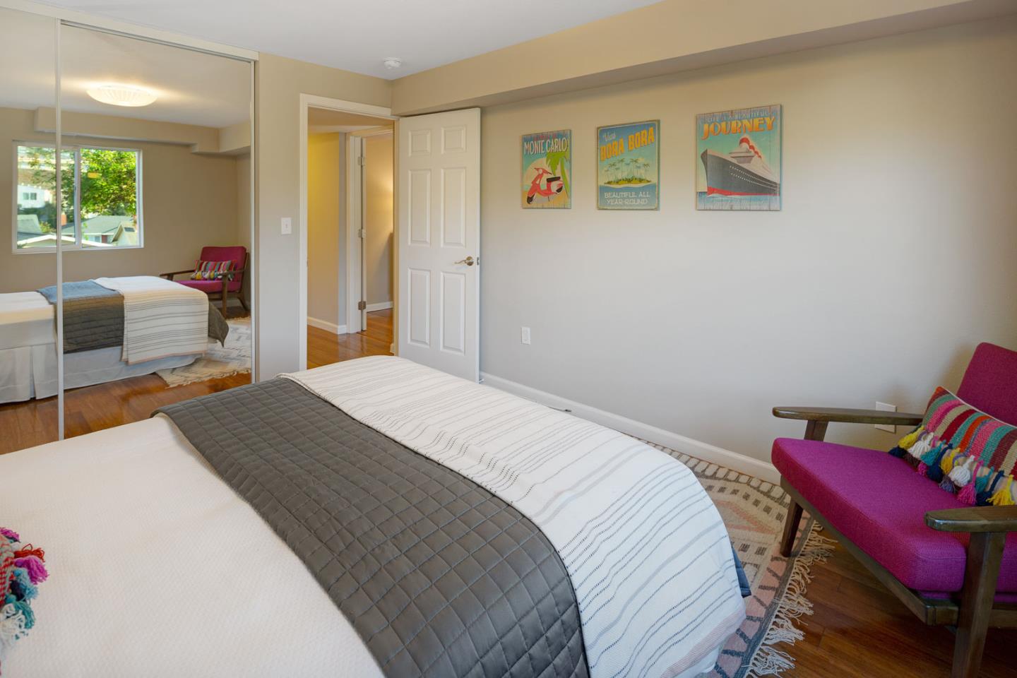 17 Moon Gate Court Pacifica, CA 94044 - Photo 32 of 36 a bedroom with a bed and a chair