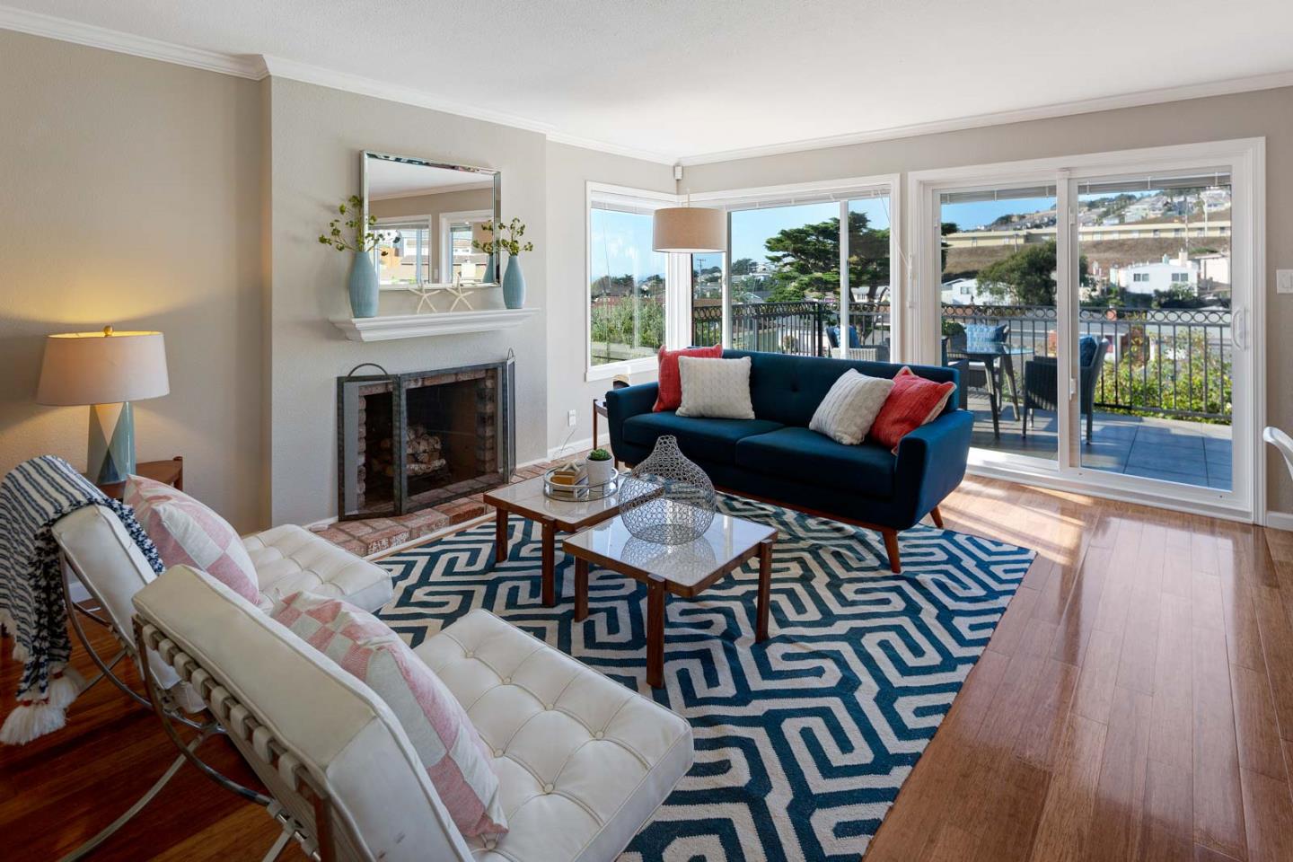 17 Moon Gate Court Pacifica, CA 94044 - Photo 6 of 36 a living room with furniture and a fireplace