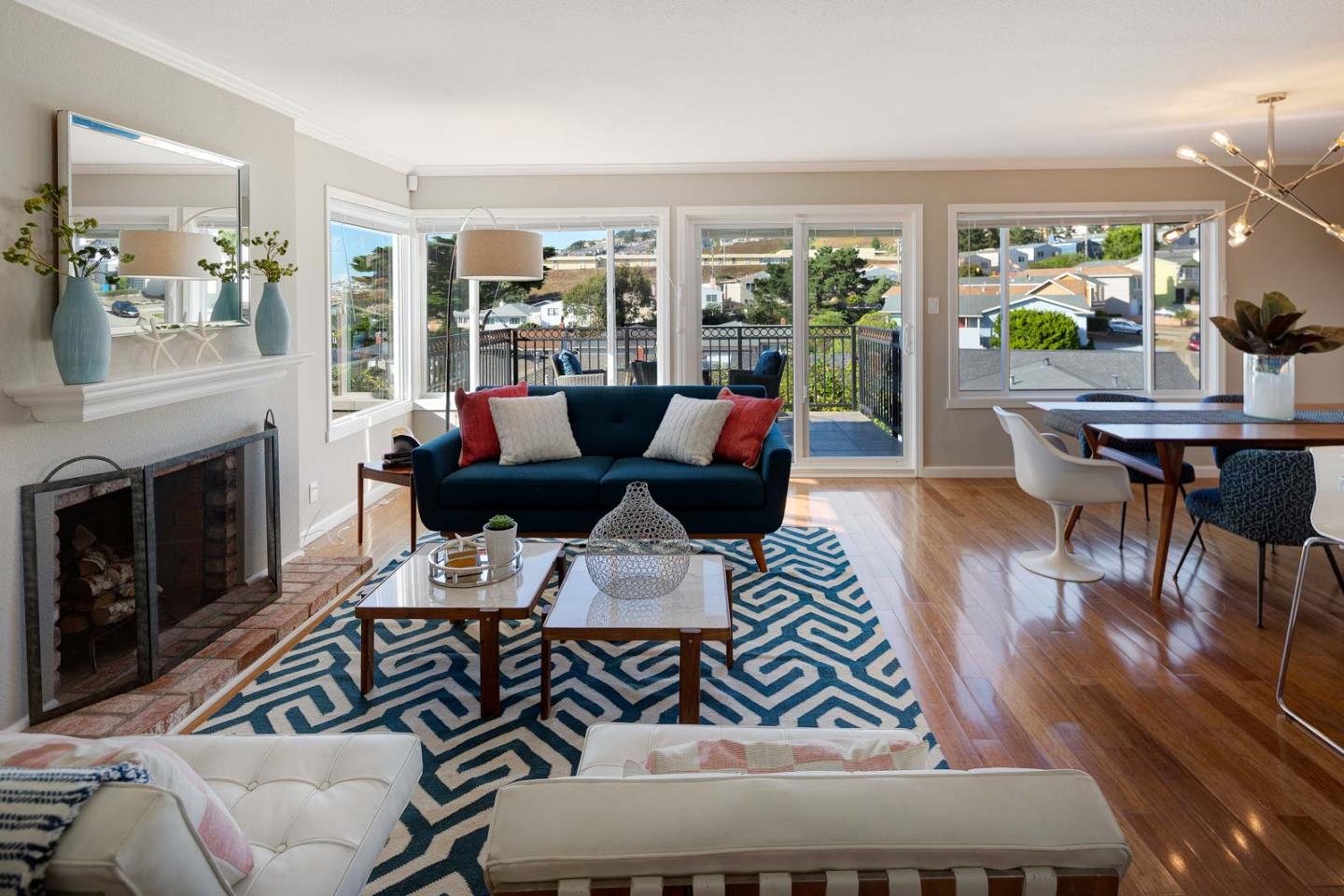 17 Moon Gate Court Pacifica, CA 94044 - Photo 7 of 36 a living room with furniture fireplace and a large window
