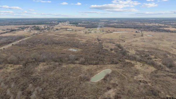 a view of roof with microwave