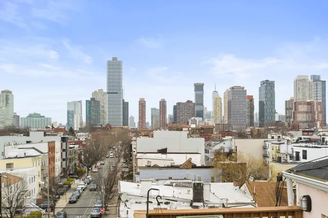 a view of a city with tall buildings