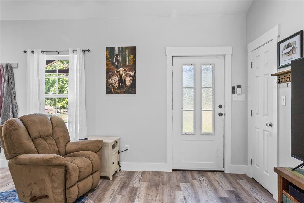 1685 Fleming Road Bells, TX 75414 - Photo 4 of 30 a living room with furniture and a window