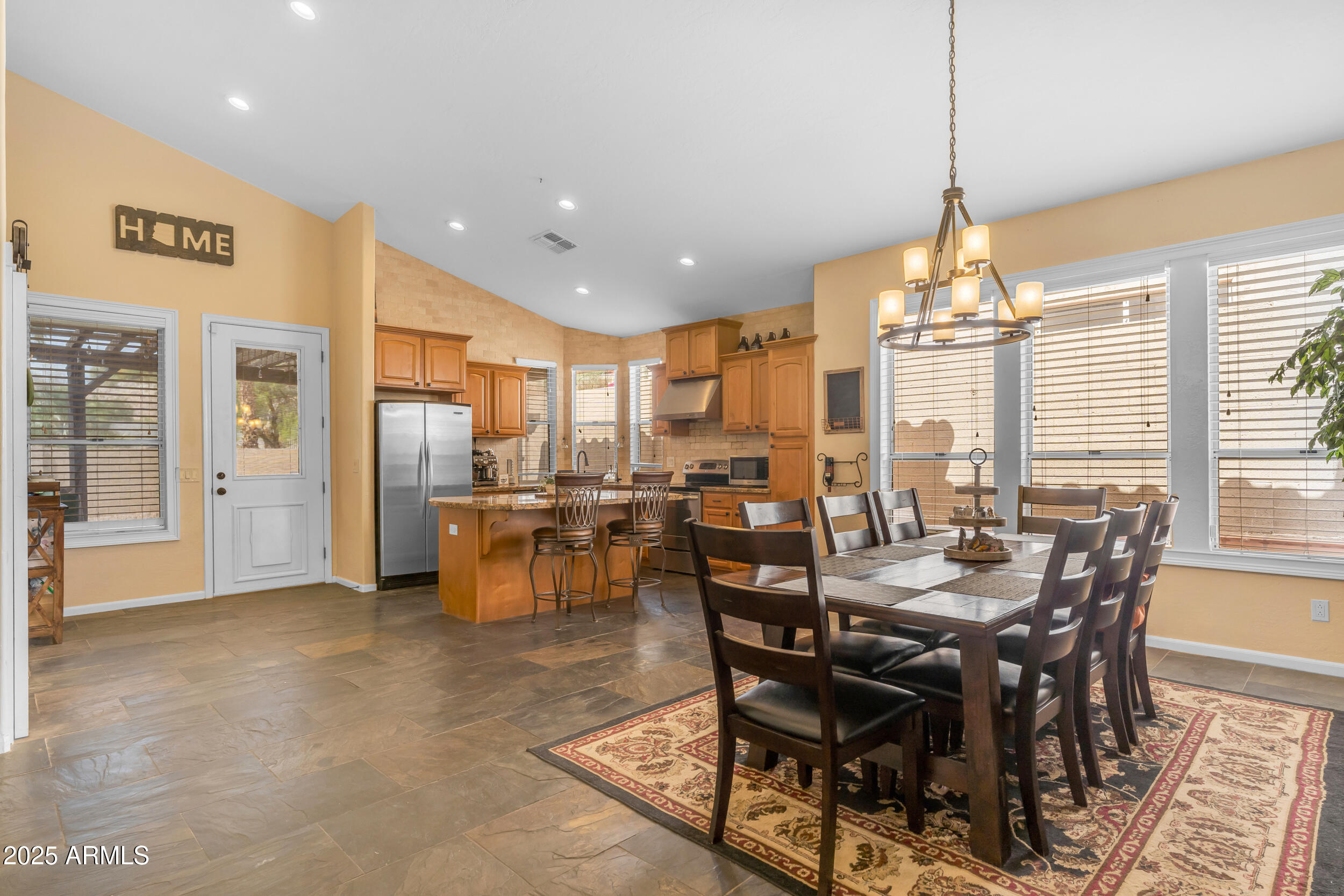 16044 South 24th Place Phoenix, AZ 85048 - Photo 10 of 42 a view of a dining room with furniture