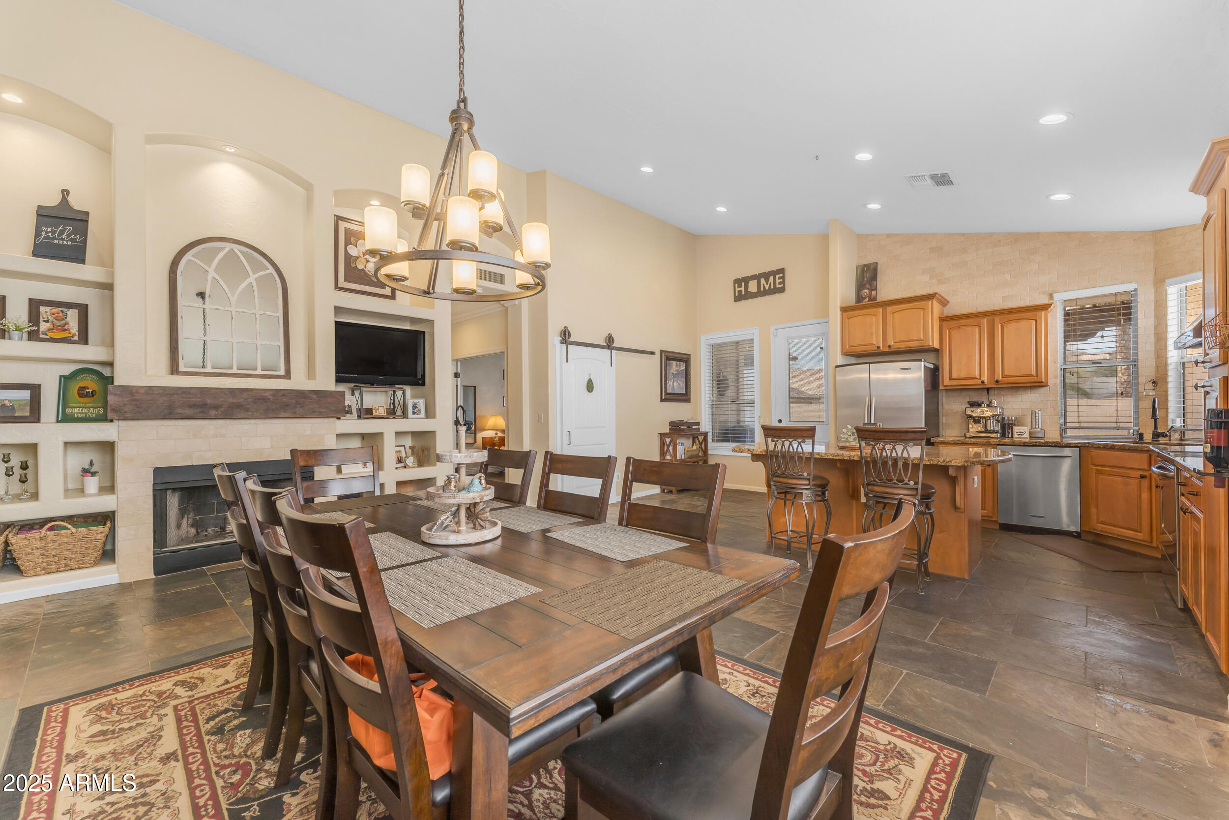 16044 South 24th Place Phoenix, AZ 85048 - Photo 11 of 42 a view of a dining room with furniture