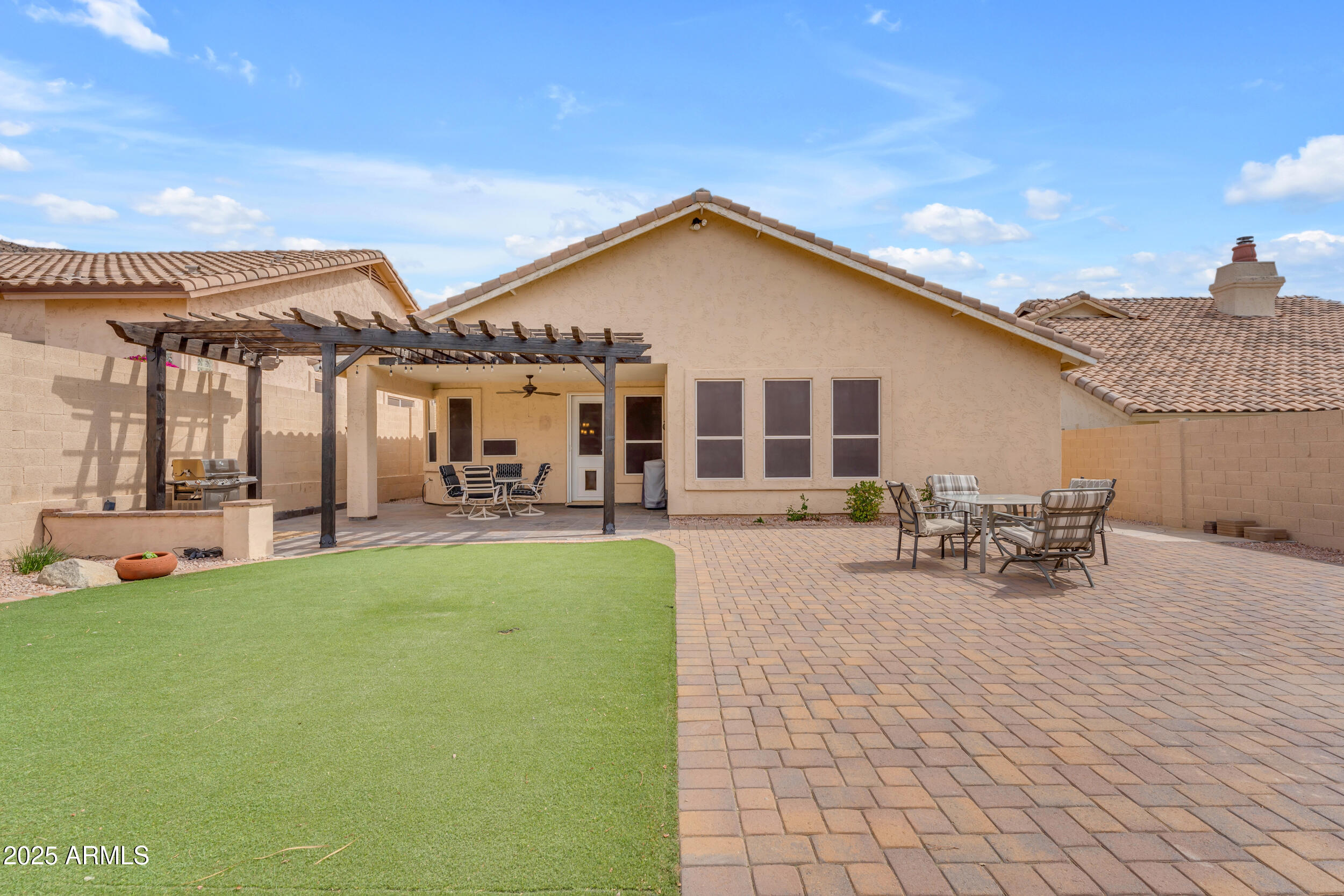 16044 South 24th Place Phoenix, AZ 85048 - Photo 31 of 42 a view of a house with sitting area and furniture