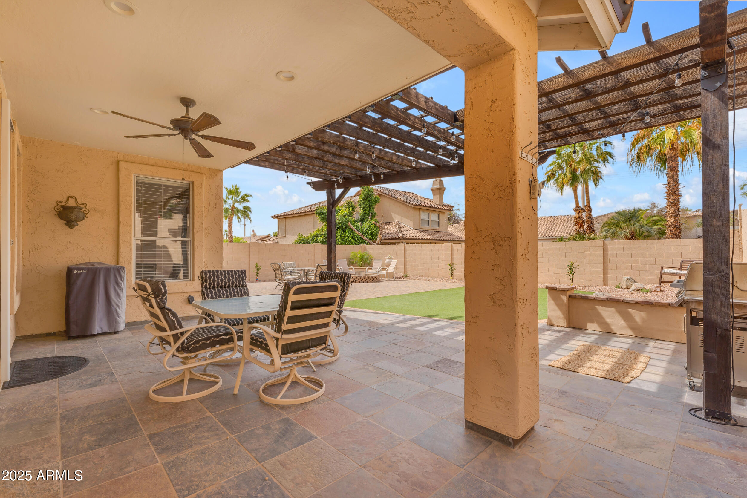16044 South 24th Place Phoenix, AZ 85048 - Photo 34 of 42 a view of an outdoor dining space with a patio