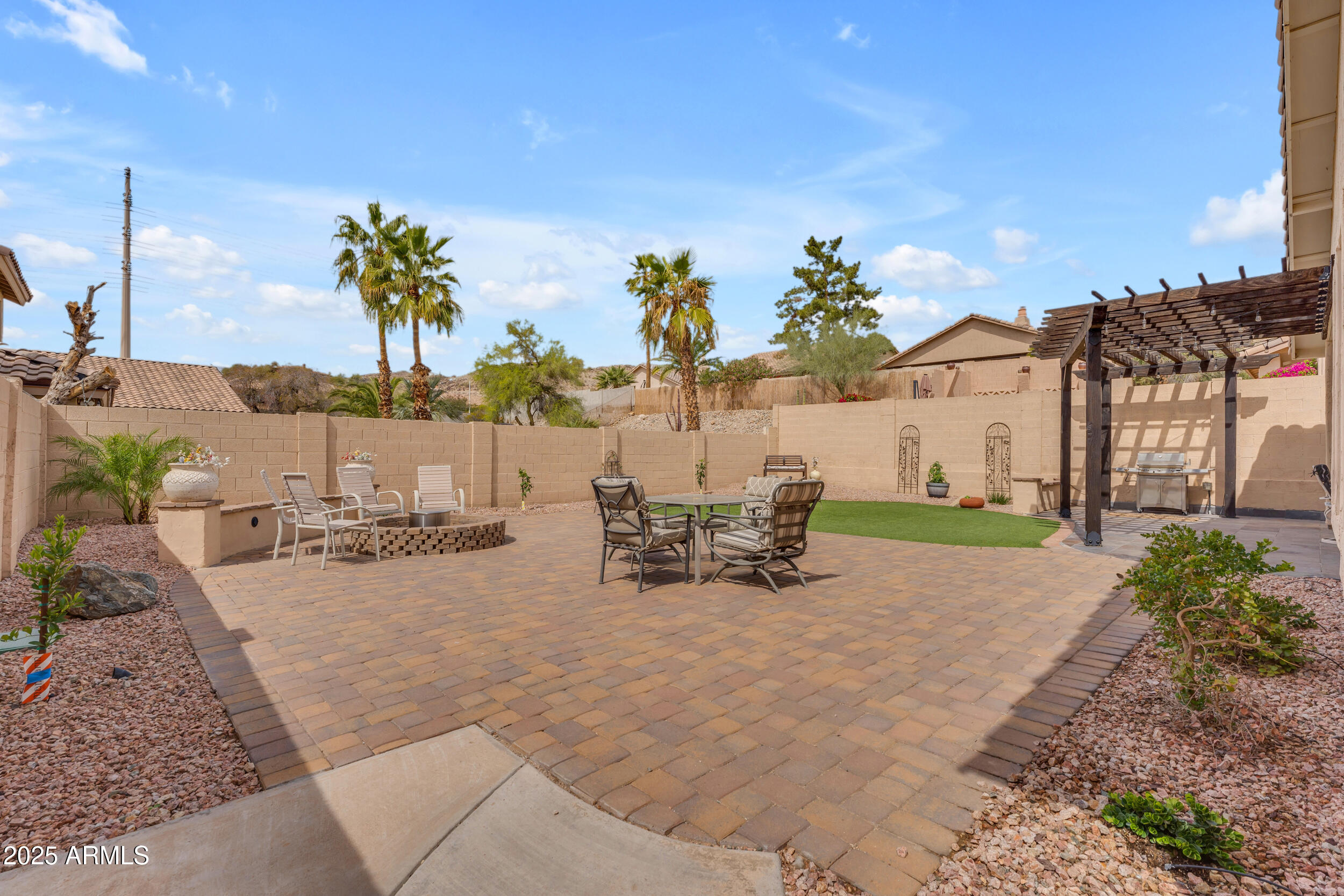 16044 South 24th Place Phoenix, AZ 85048 - Photo 38 of 42 a view of a backyard with a sitting area