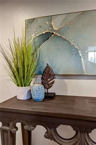 a sink with a potted plant on it