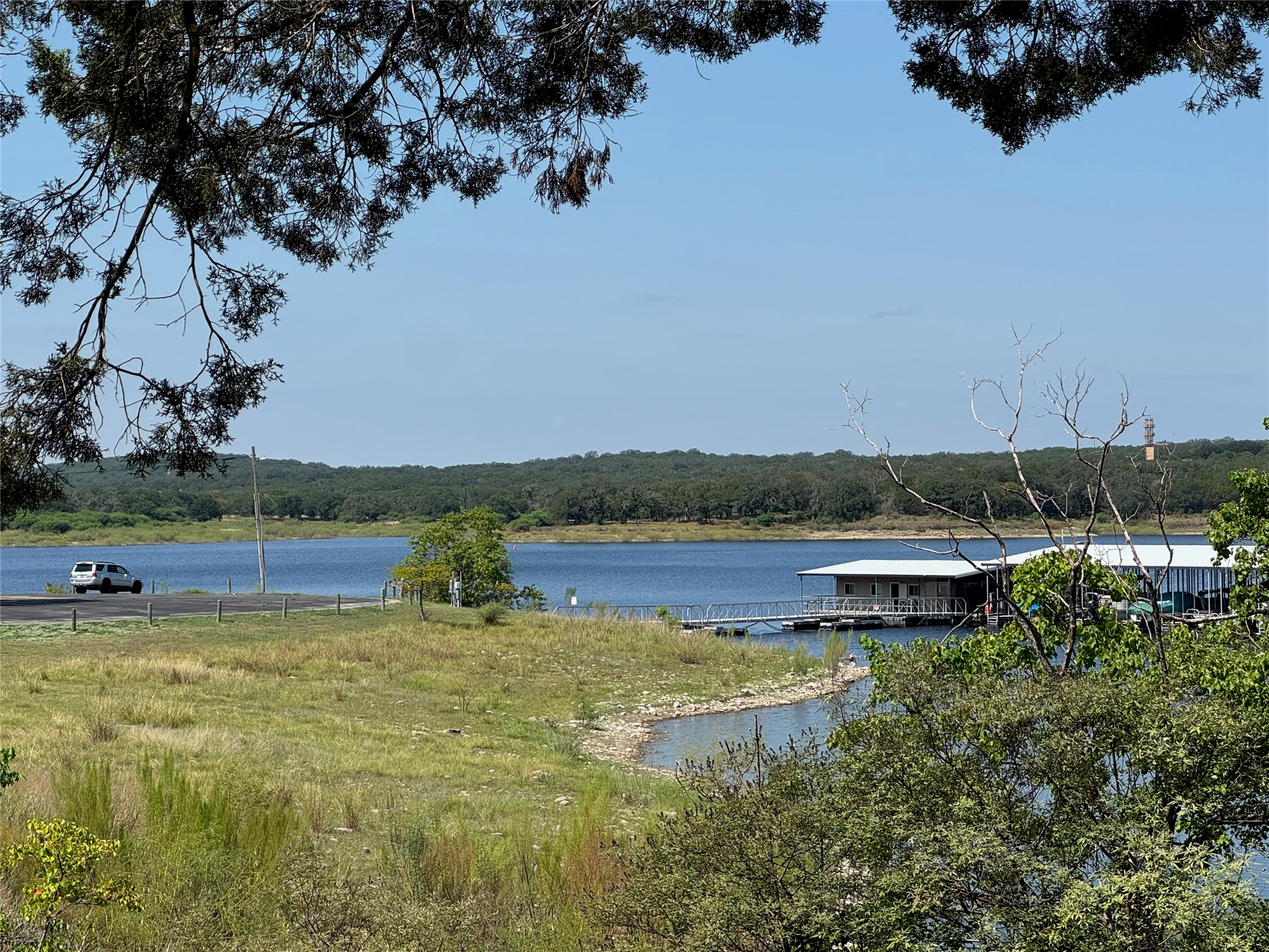 20800 Cedar Ridge Cove Lago Vista, TX 78645 - Photo 10 of 10 a view of a lake with houses