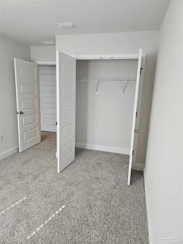 an empty room with closet