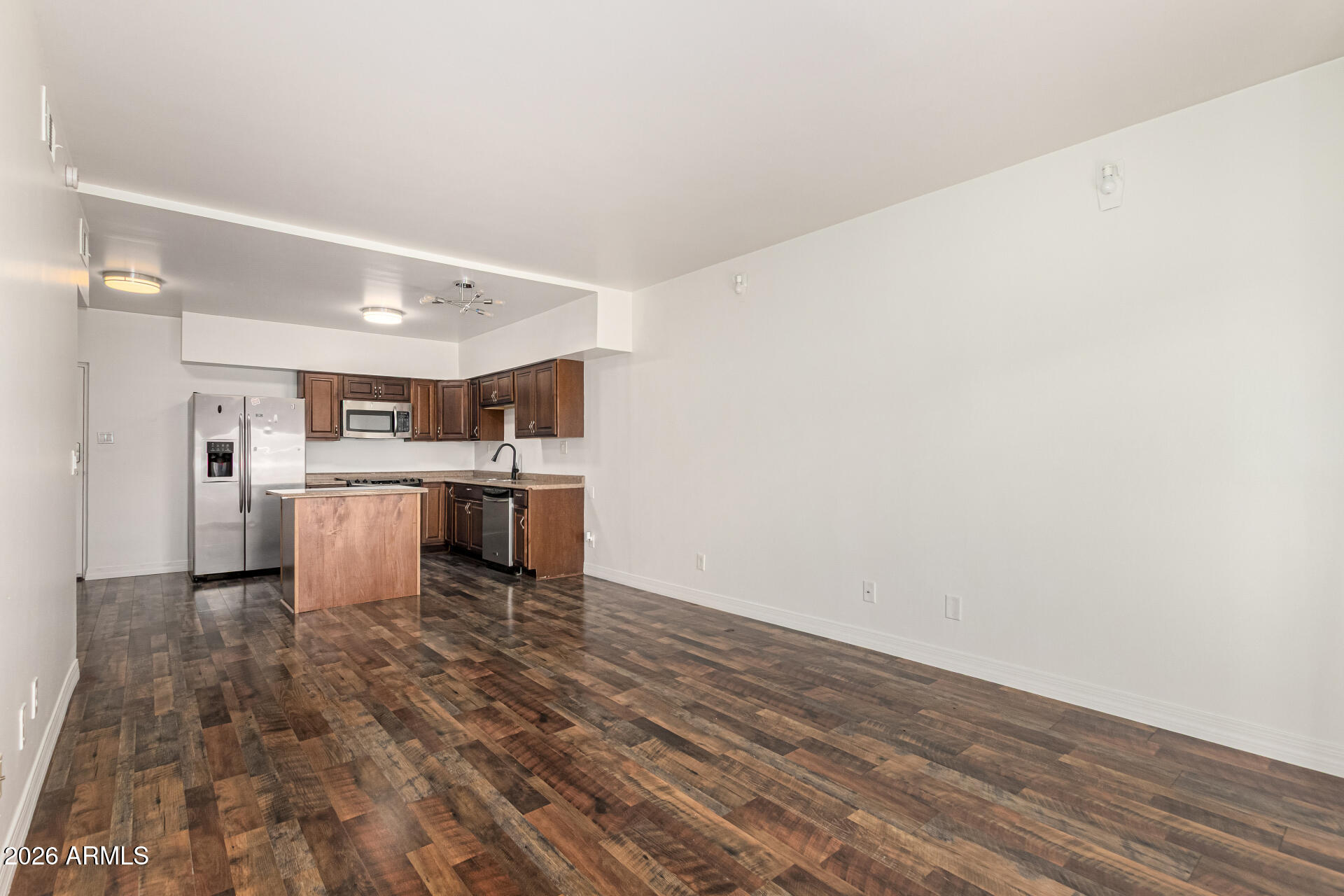 357 East Thomas Road, Unit A111 Phoenix, AZ 85012 - Photo 11 of 41 a view of kitchen with wooden floor