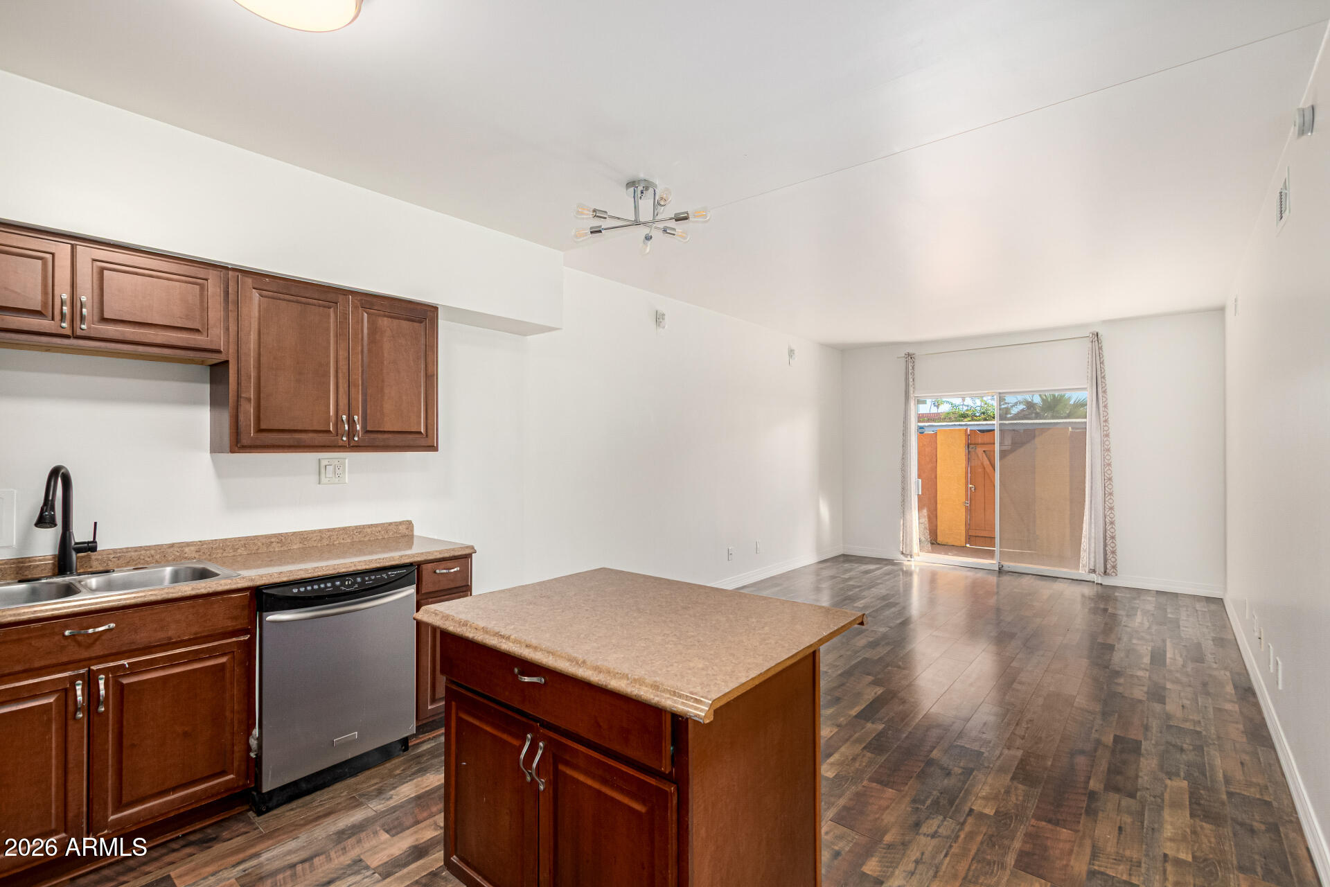 357 East Thomas Road, Unit A111 Phoenix, AZ 85012 - Photo 12 of 41 a kitchen with a sink a stove and cabinets