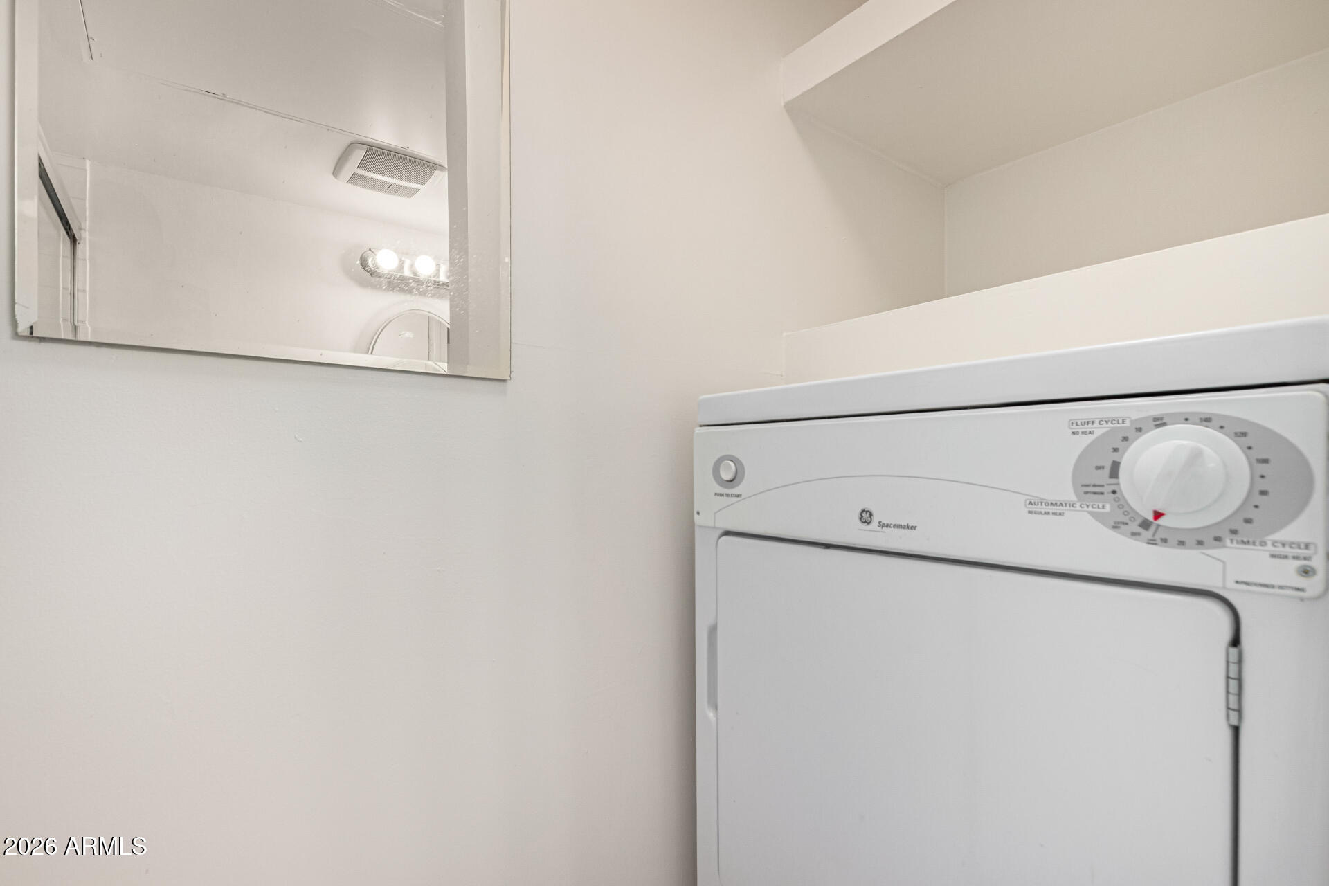 357 East Thomas Road, Unit A111 Phoenix, AZ 85012 - Photo 29 of 41 a utility room with dryer and washer