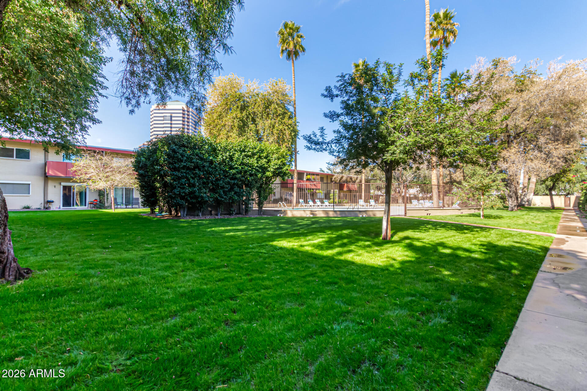 357 East Thomas Road, Unit A111 Phoenix, AZ 85012 - Photo 34 of 41 a view of a park with large trees