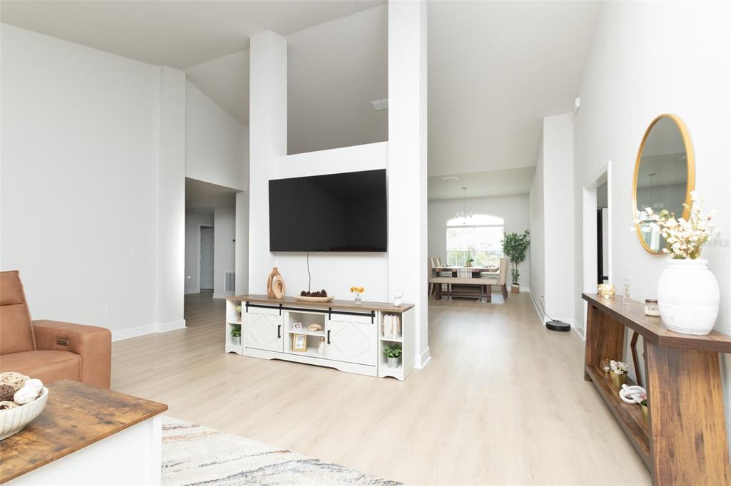 11267 Northwest 4th Street Ocala, FL 34482 - Photo 13 of 86 a living room with furniture and a flat screen tv