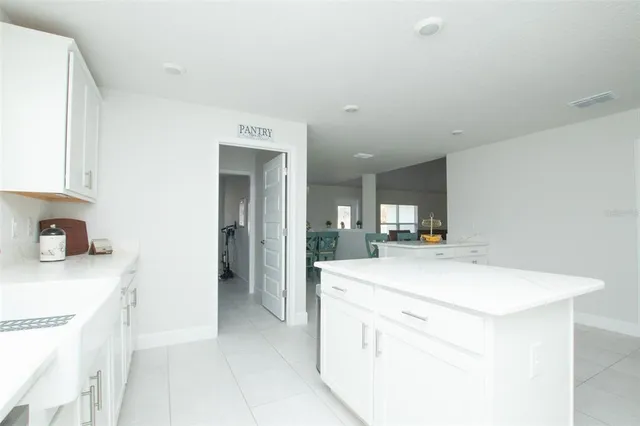 a white bath tub sitting next to a window