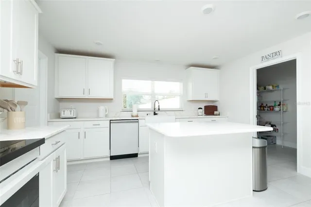 a spacious bathroom with a shower a sink and a bathtub