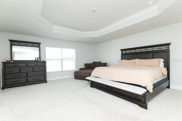 a bathroom with a sink vanity and a toilet