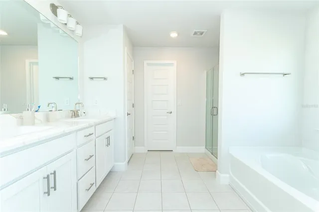 a view of a storage and utility room with racks on the wall