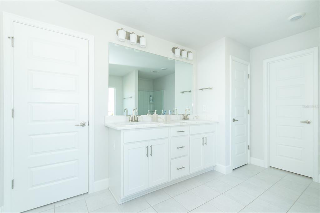 11267 Northwest 4th Street Ocala, FL 34482 - Photo 43 of 86 a bathroom with a sink and a mirror
