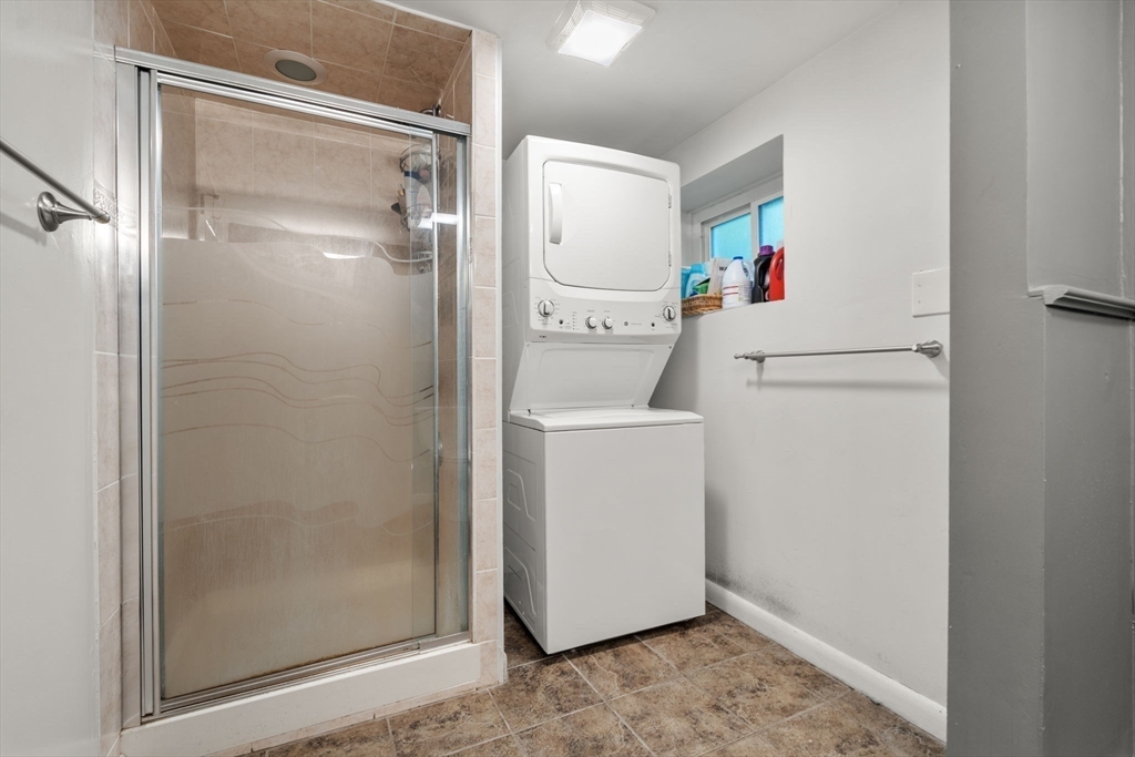 174 Middlesex Road Chestnut Hill, MA 02467 - Photo 16 of 18 a utility room with dryer and washer
