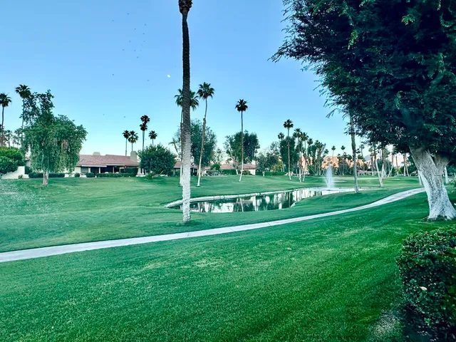 a view of a park with welcome board
