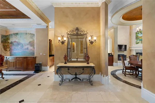 a bathroom with a granite countertop sink a toilet a mirror and shower