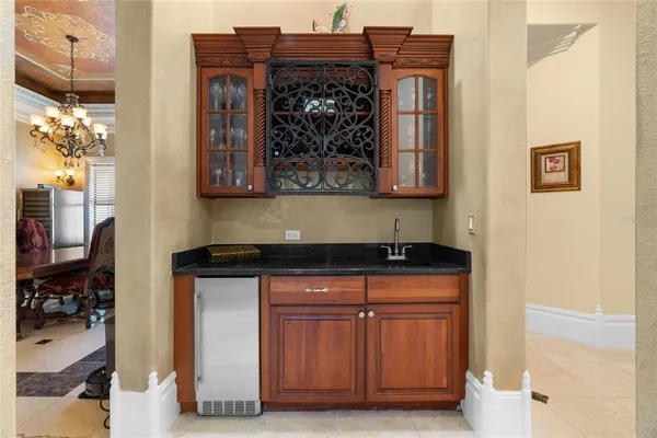 a view of a floor to ceiling window and chair in the room