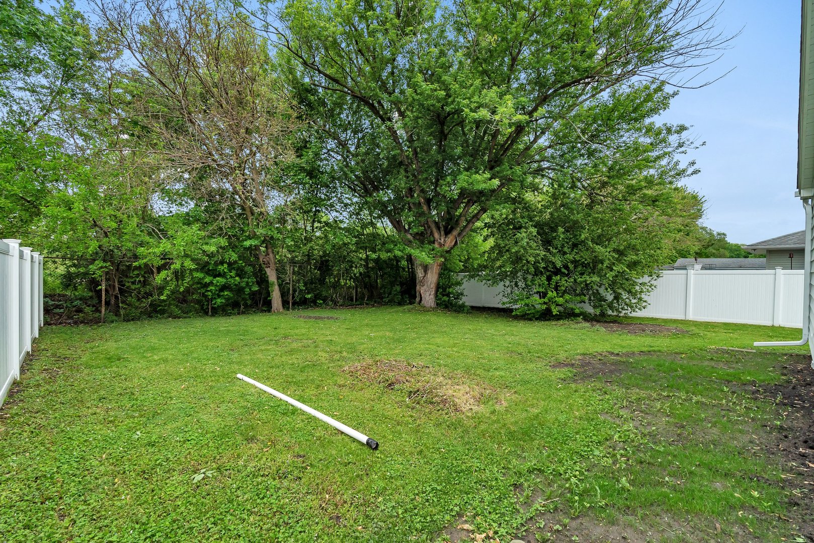 1314 West Washington Street Ottawa, IL 61350 - Photo 20 of 21 a view of a grassy field with trees in the background