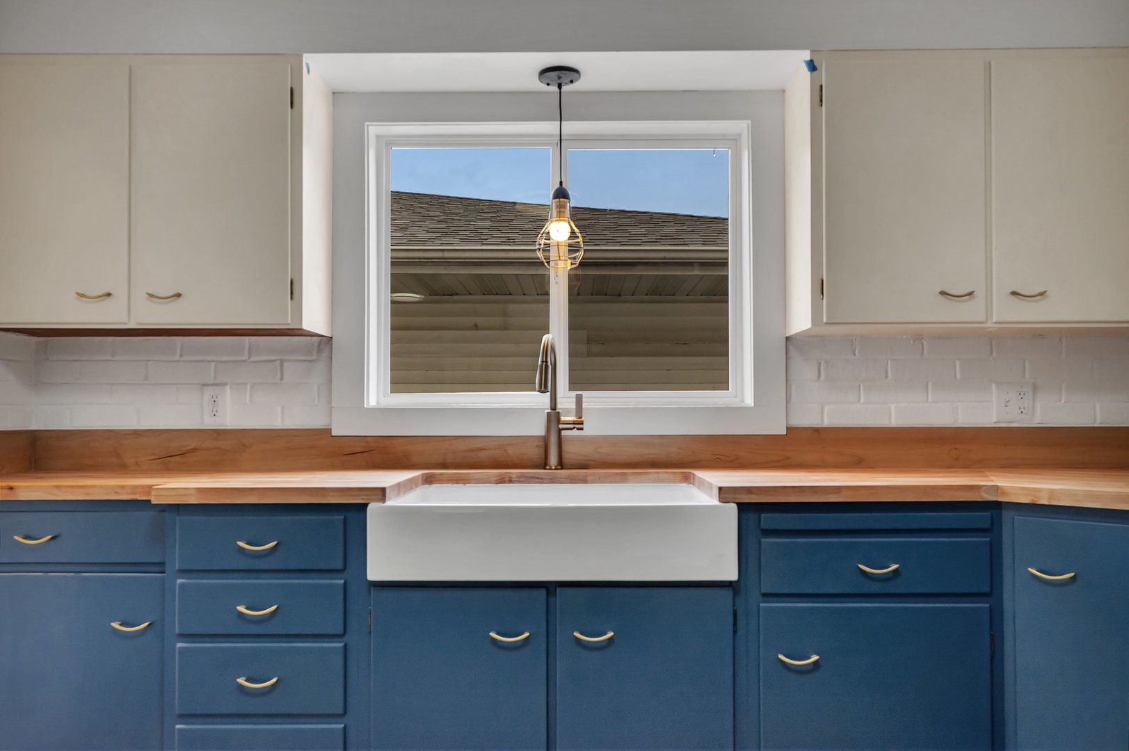 1314 West Washington Street Ottawa, IL 61350 - Photo 9 of 21 a kitchen with a sink and cabinets