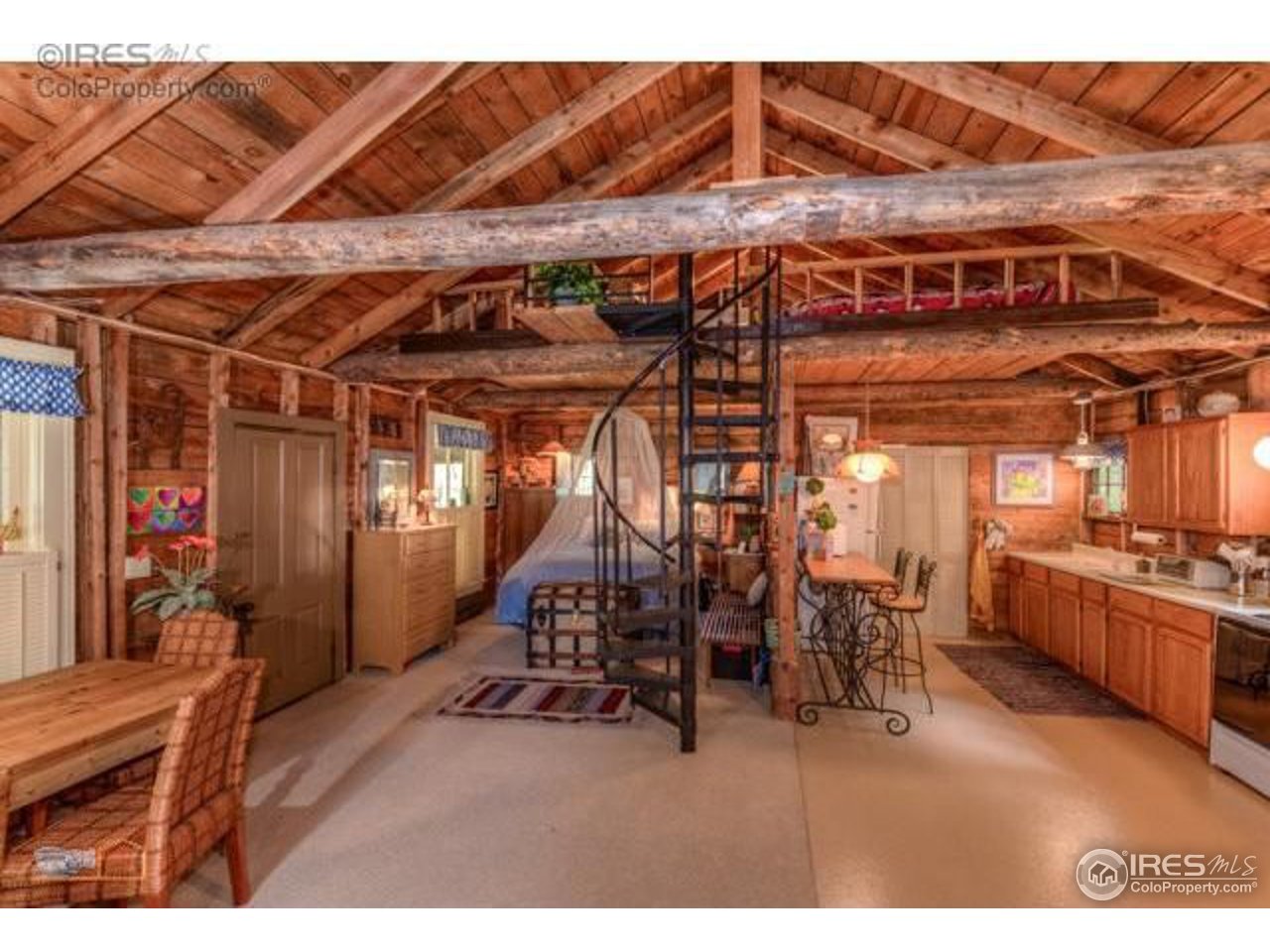 Bedroom to the left, kitchen to the right, loft