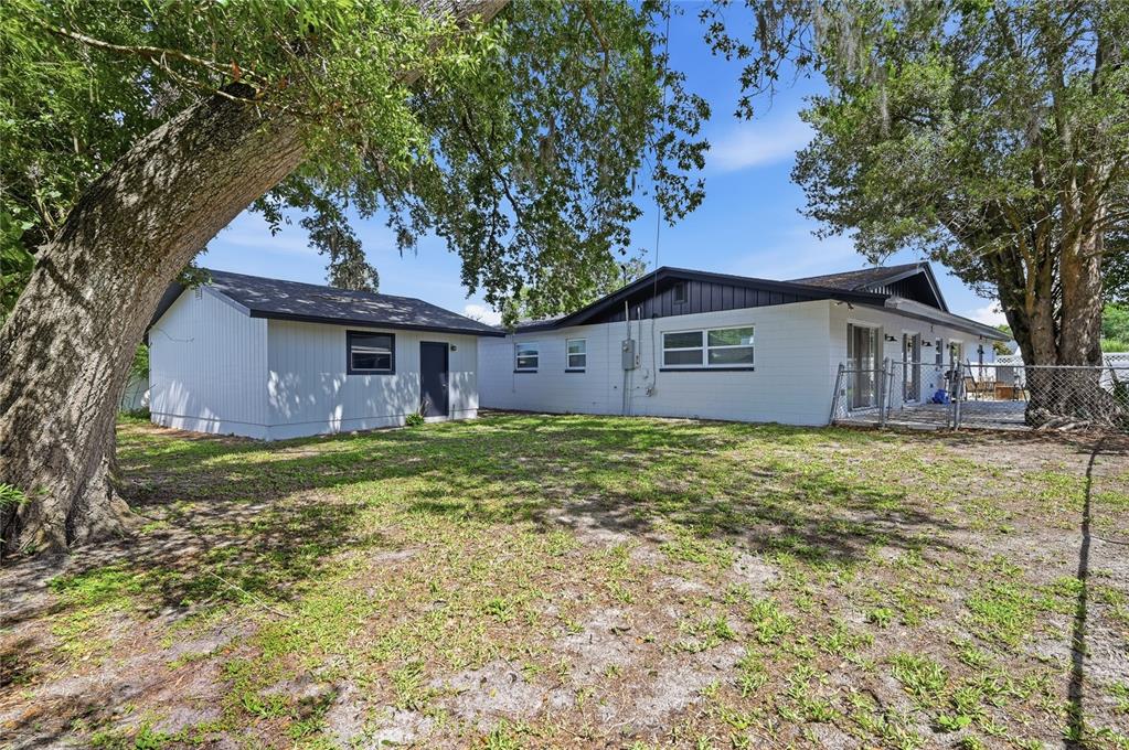 1946 Strathaven Road Winter Park, FL 32792 - Photo 37 of 37 a view of a house with a yard