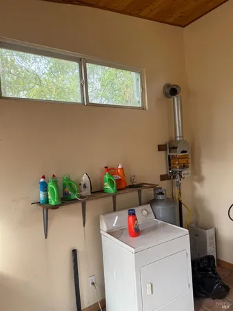 a bathroom with a sink and a window