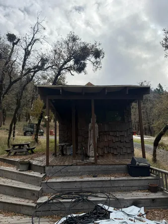 a view of house with tree s