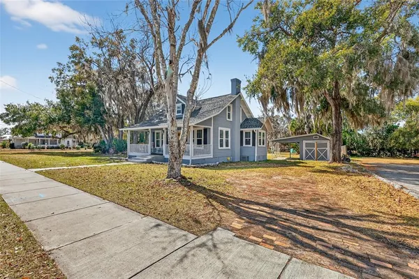 a front view of a house with swimming pool