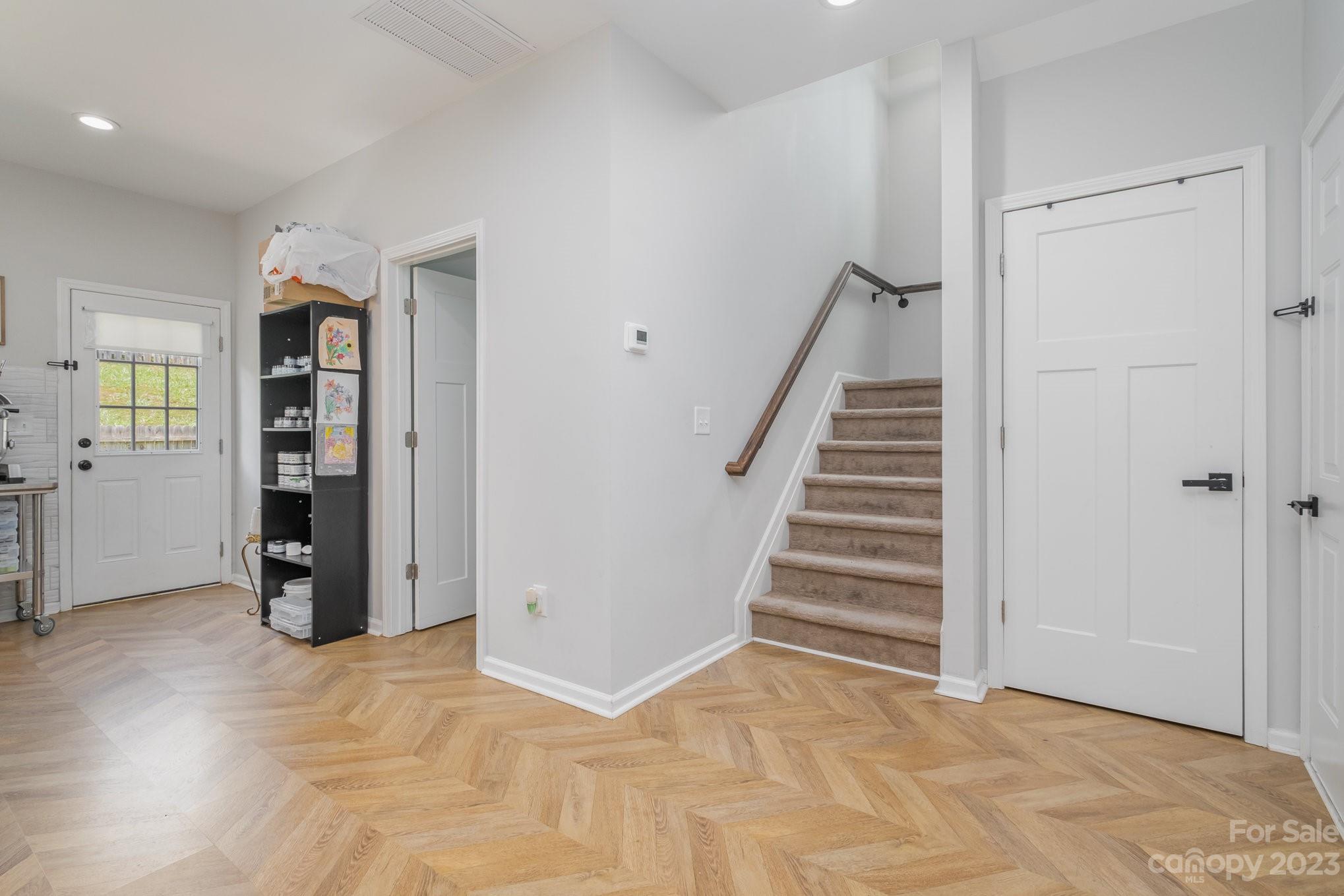 2213 Turtle Point Road Charlotte, NC 28262 - Photo 14 of 28 a view of an empty room with stairs and ventilation