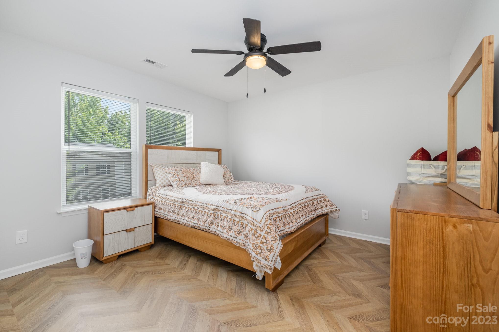 2213 Turtle Point Road Charlotte, NC 28262 - Photo 20 of 28 a bedroom with a bed and window